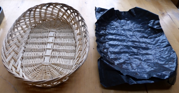 line a basket with plastic to use it to grow bulbs